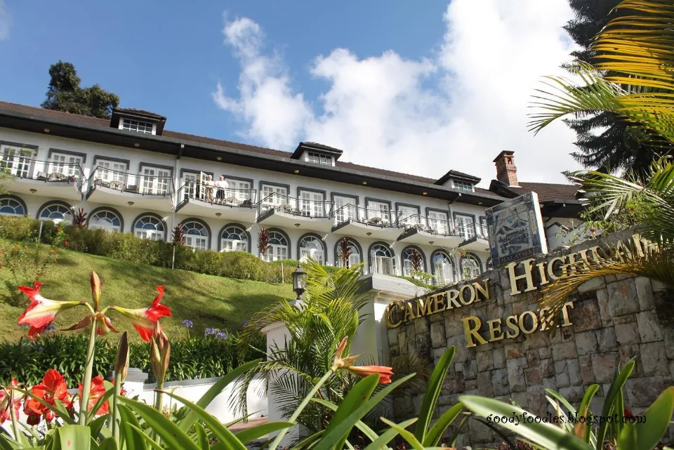 A luxurious colonial-style resort in Cameron Highlands, Malaysia, surrounded by lush greenery