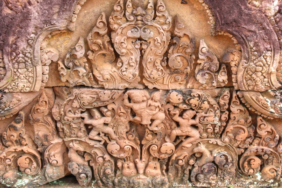 Intricate pink sandstone carvings at Banteay Srei Temple