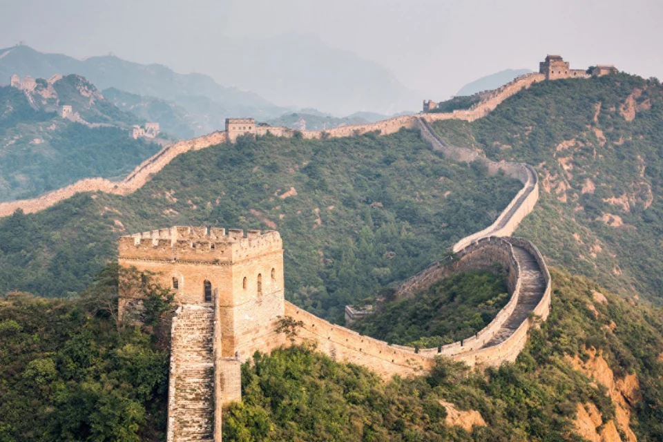 Aerial view of the Great Wall of China winding across mountains