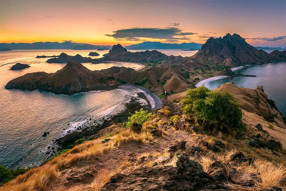 View from the top of Padar Island showing white, black, and pink sand beaches