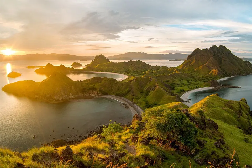 Aerial view of Padar Island in Komodo National Park at sunrise with three curved beaches