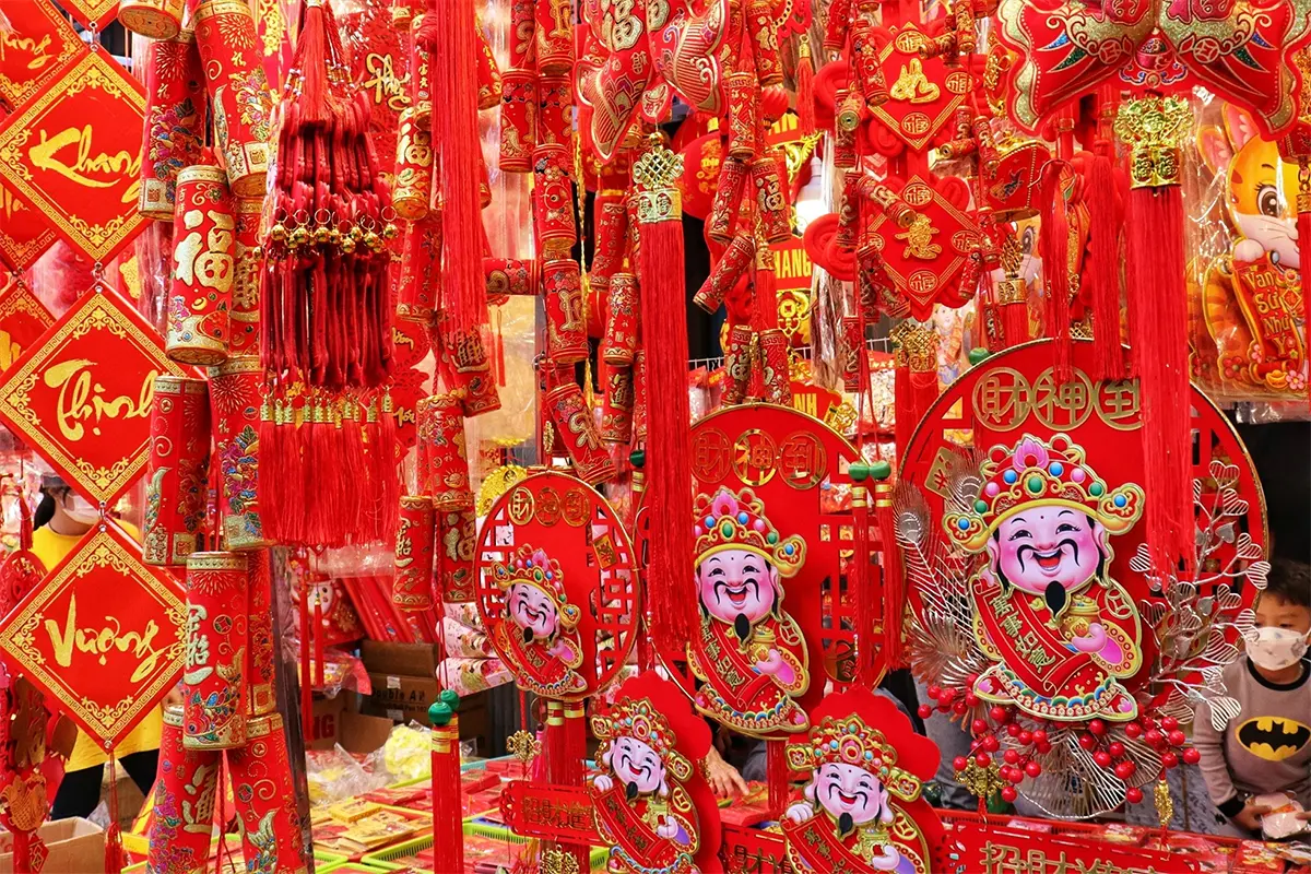 Traditional calligraphy and red banners for Tet