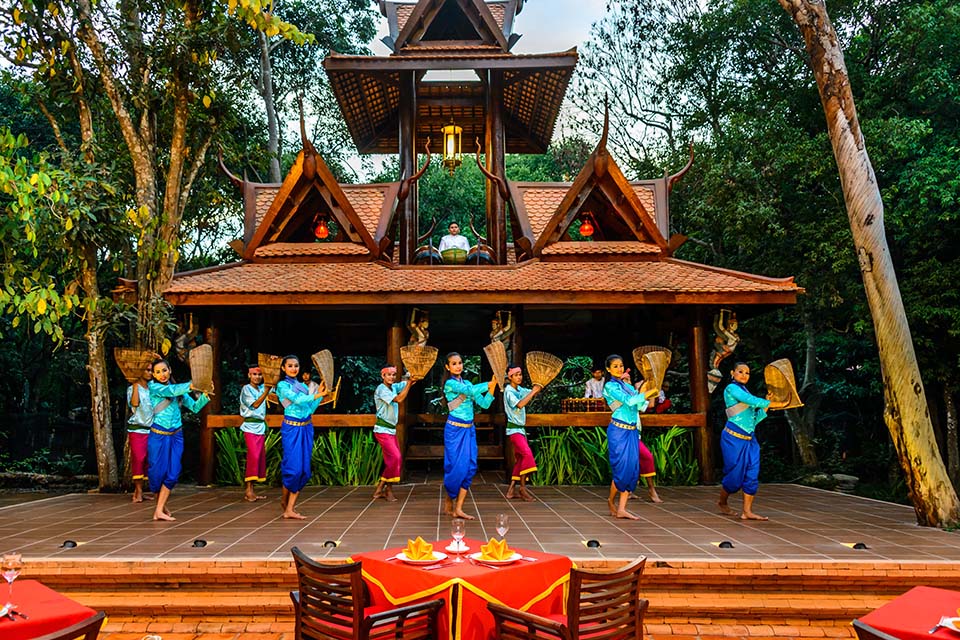 Visitors enjoying a traditional performance at Cambodian Cultural Village