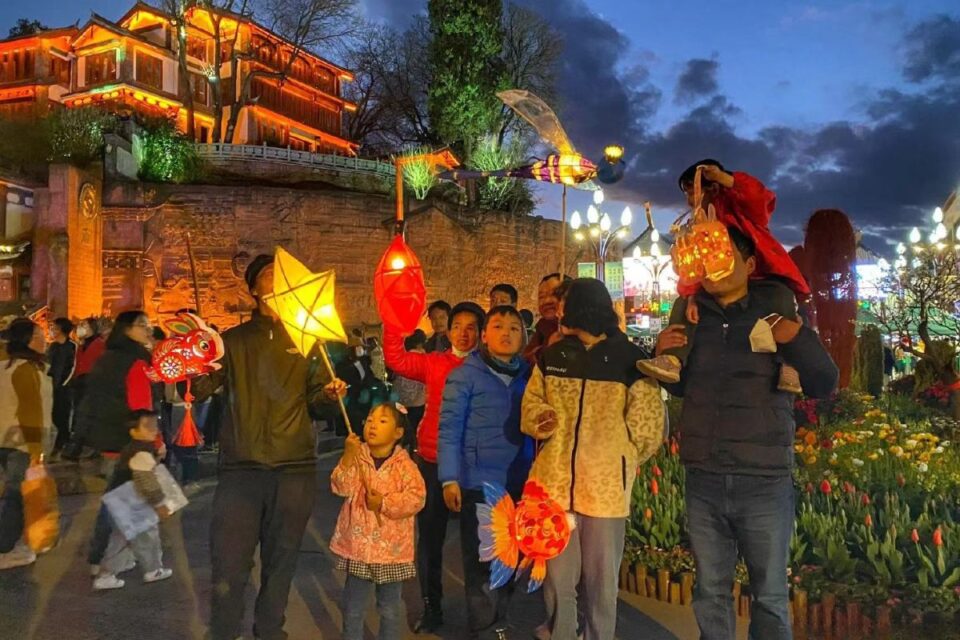 Children carrying colorful lanterns during Mid Autumn Festival 2025