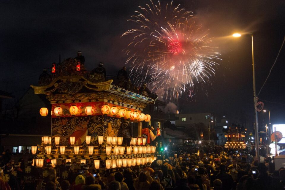Lantern-lit floats parading through Chichibu streets at night