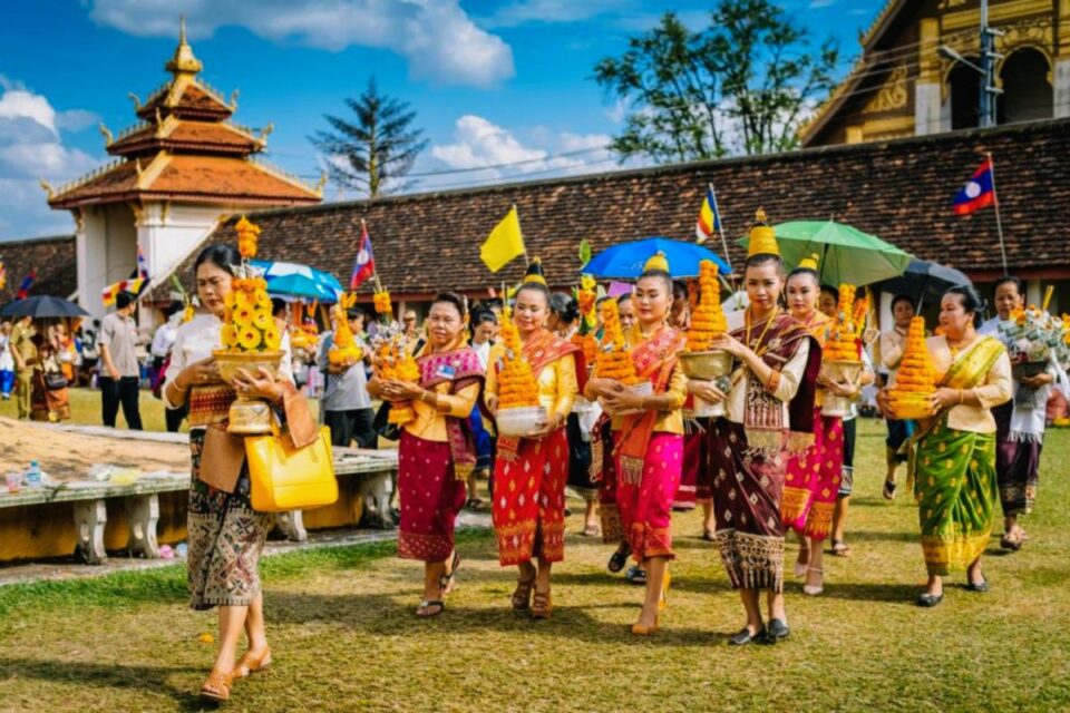 Wax Castle Procession during That Luang Festival in Laos